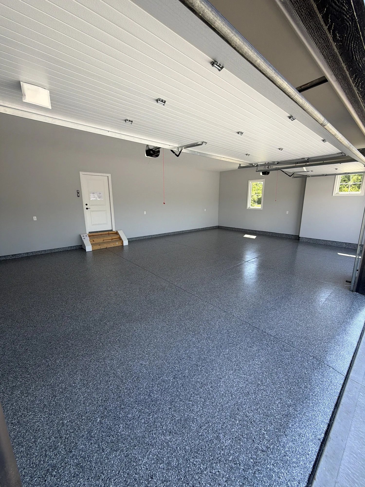 Platinum Surface Prep decorative flake floor in a Columbus three-car garage