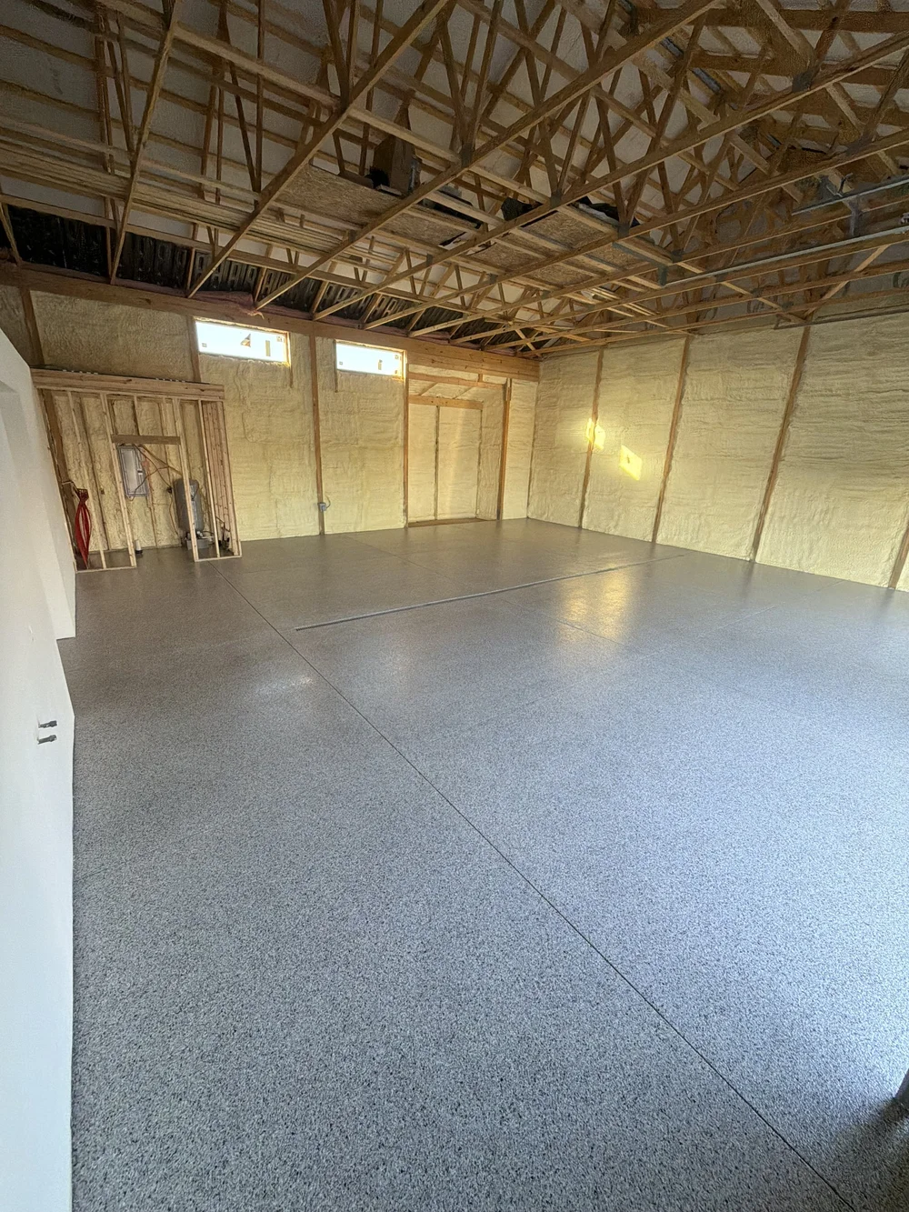 Finished gray flake floor in a Thornville barndominium workshop